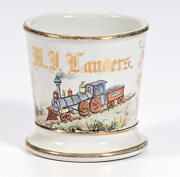 Appraisal: TRAIN SHAVING MUG Porcelain mug with gilding landscape with train