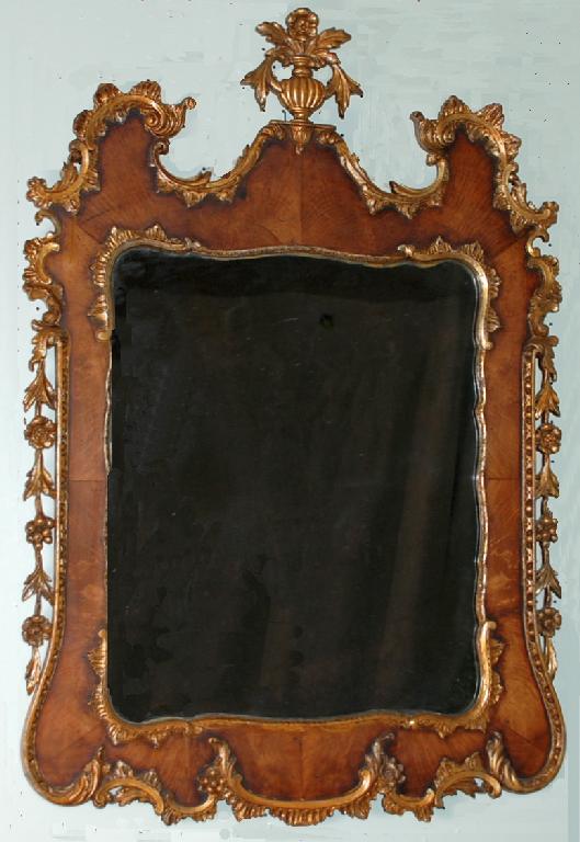 Appraisal: EARLY GEORGIAN STYLE WALNUT AND PARCEL GILT WALL MIRROR the