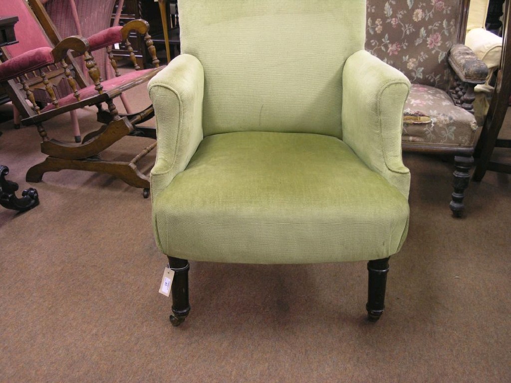 Appraisal: A late Victorian armchair upholstered in a green fabric