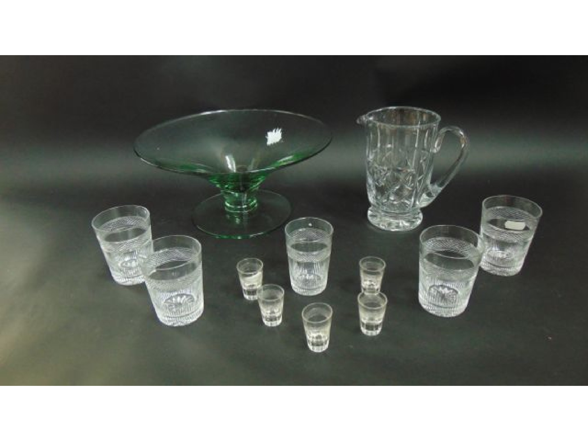 Appraisal: Four good quality clear cut glass beakers with vertical cut