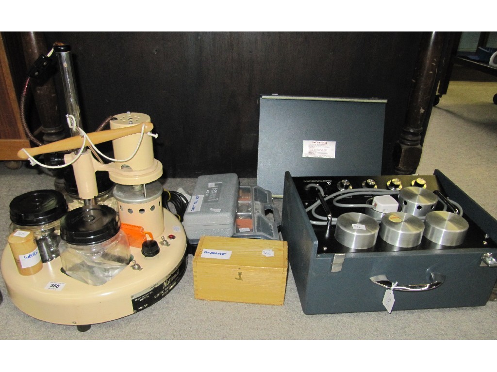 Appraisal: Lot comprising two watch cleaning machines some watch parts a