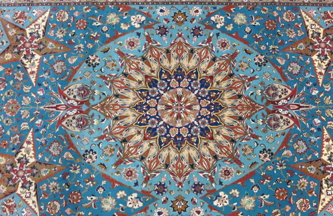 Appraisal: HAND KNOTTED PERSIAN CARPET floral and central floral medallion design