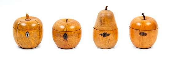 Appraisal: Four Regency Fruitwood Fruit-Form Tea Caddies Height of pear-form example