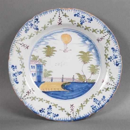 Appraisal: Rare English polychrome Delftware Ballooning plate circa floral swag border