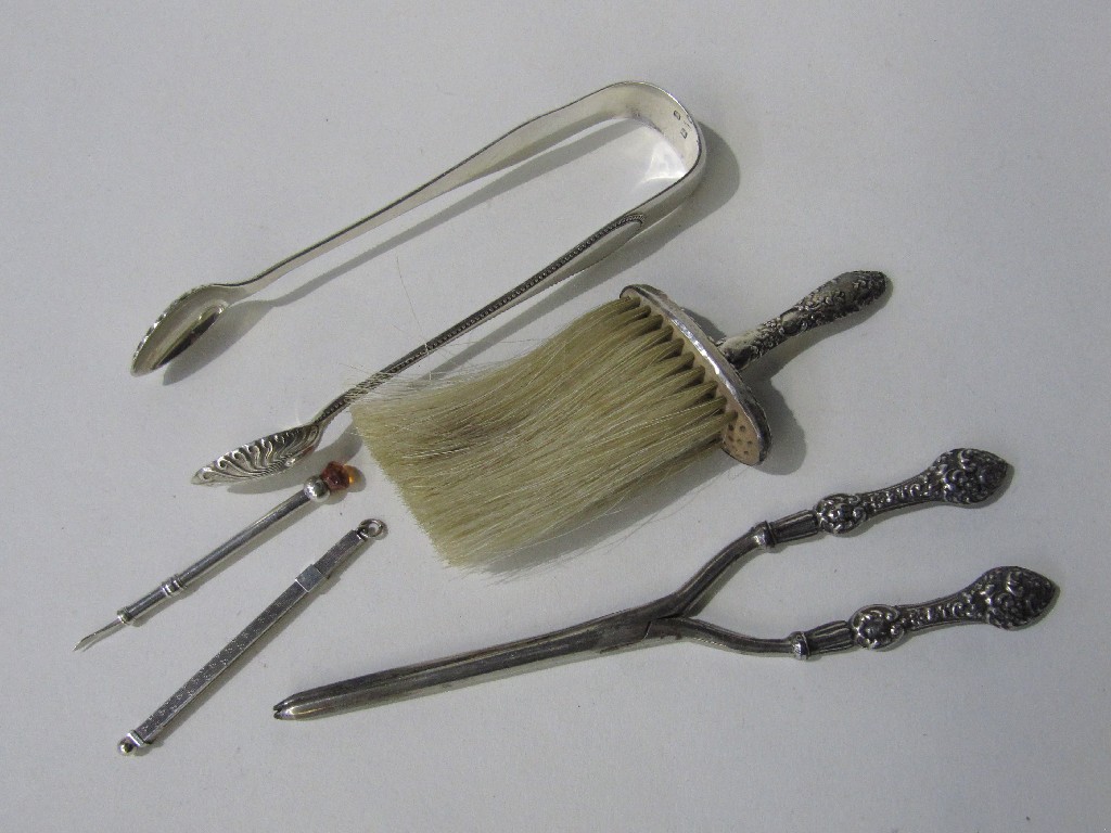 Appraisal: Lot comprising Victorian silver sugar tongs crumb brush hair tongs