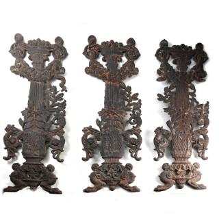 Appraisal: Three Iron Wall Hangings Three bas-relief iron wall hangings featuring