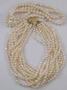 Appraisal: A multi row freshwater pearl necklace together with a single