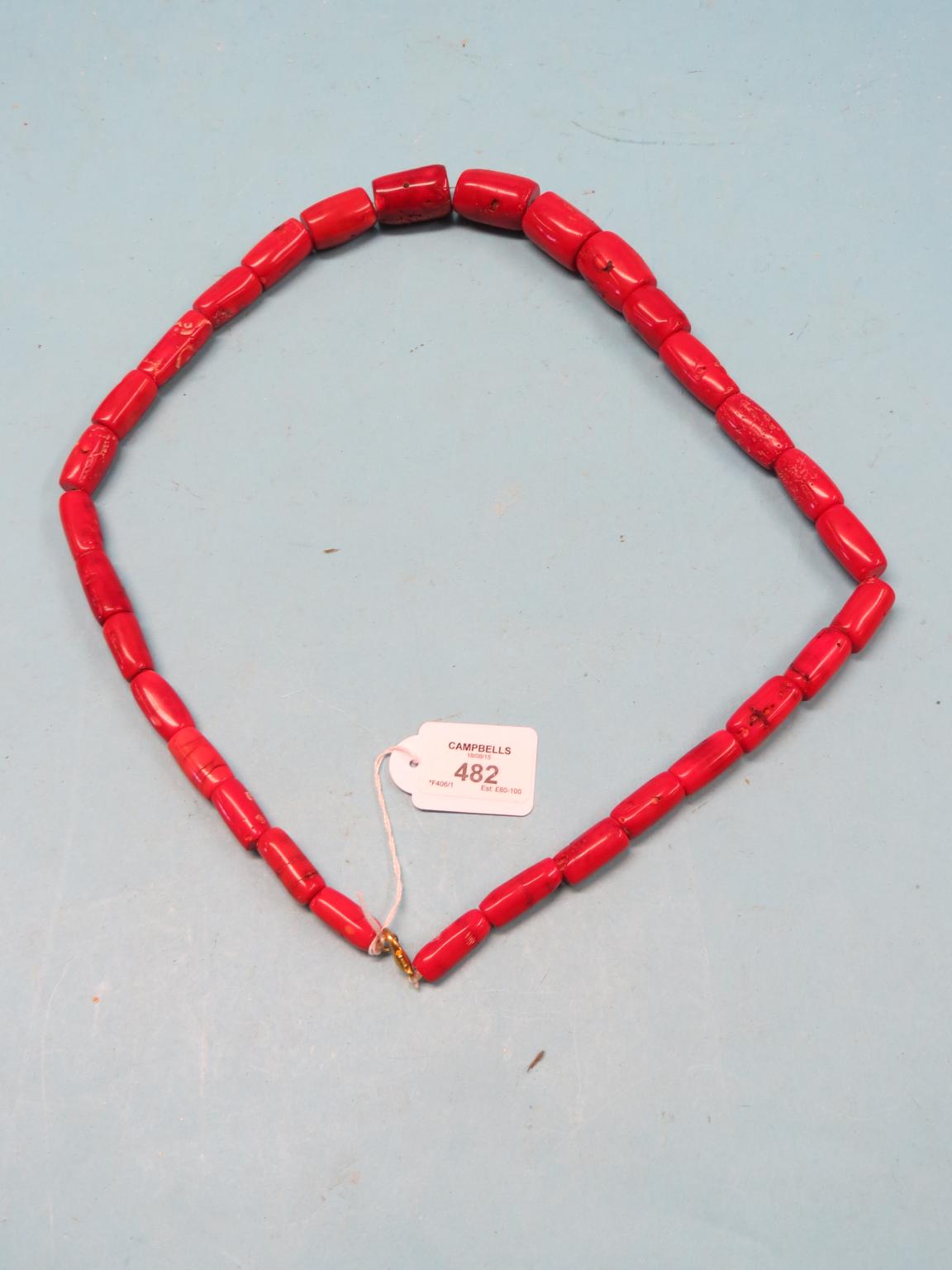 Appraisal: A red-stained coral large-bead necklace