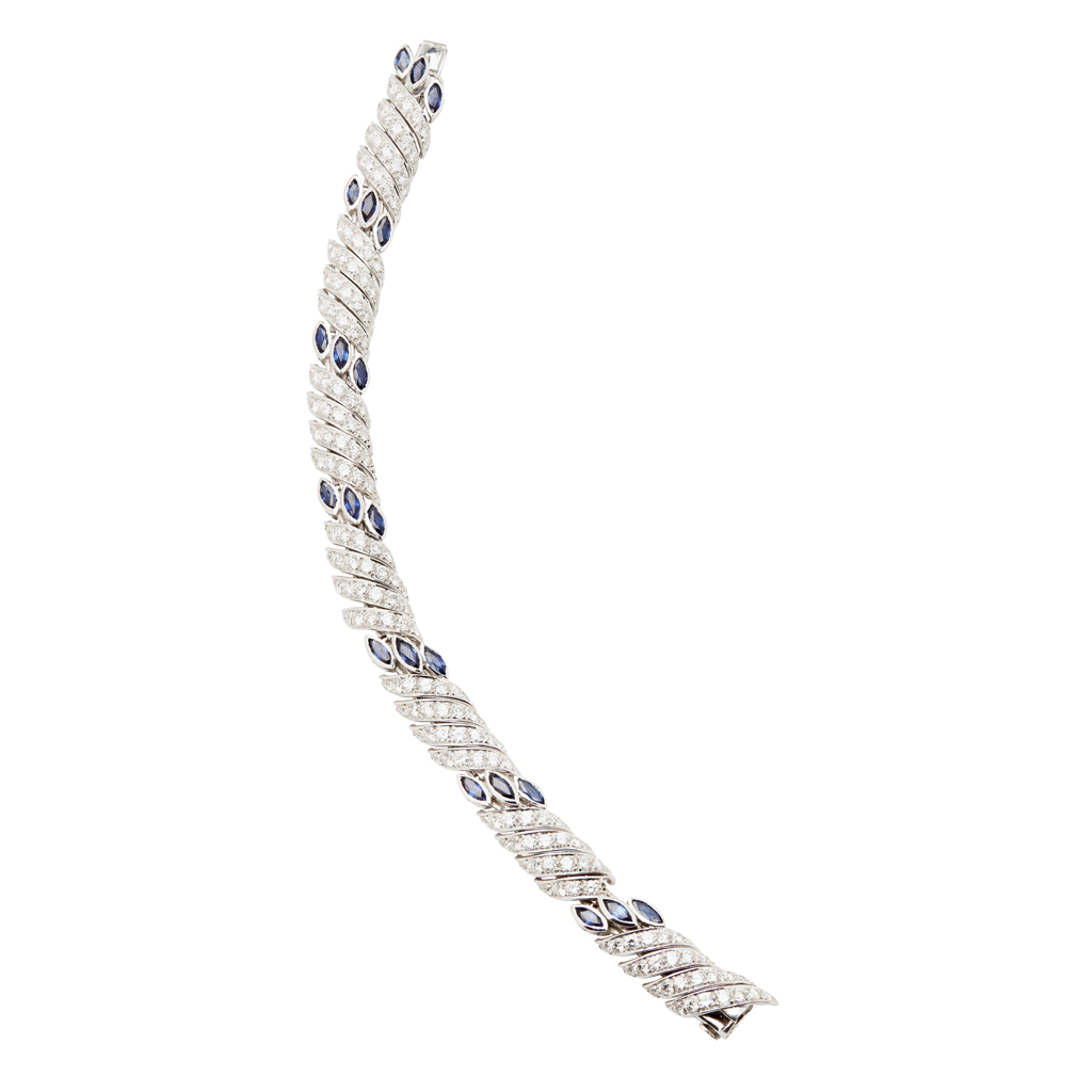 Appraisal: MOUAWAD - A diamond and sapphire set braceletcomposed of curved