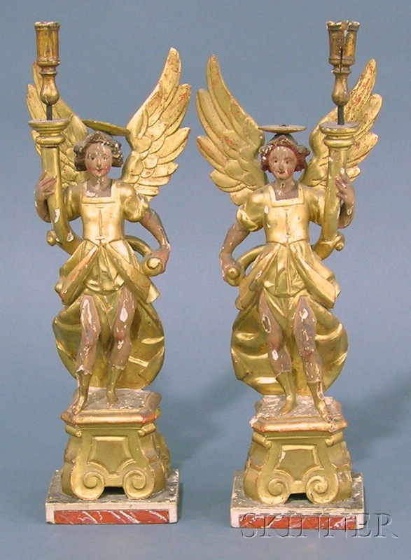 Appraisal: Pair of Italian Baroque-style Carved and Gilt Gessoed Angel-form Candlesticks