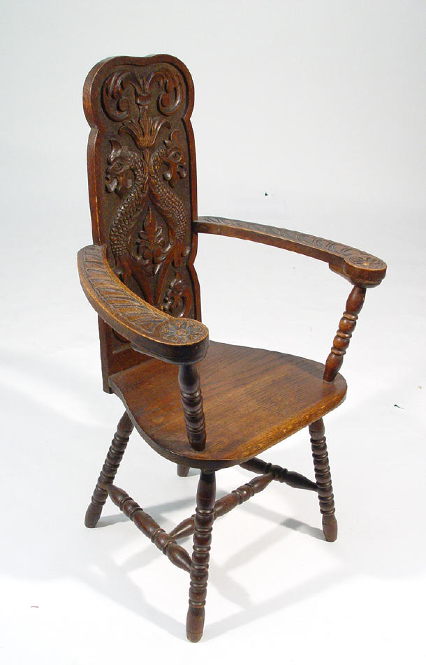 Appraisal: Serpentine carved oak hall chair