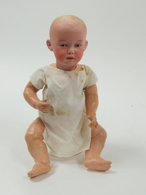 Appraisal: A bisque head German character doll the head impressed Germany