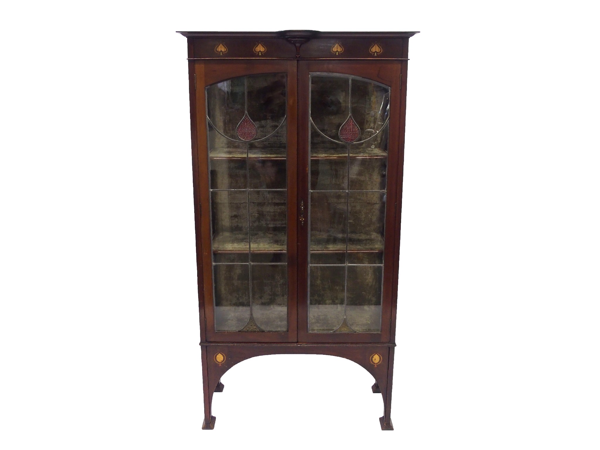 Appraisal: A Glasgow style mahogany display cabinetthe overhanging cornice above copper