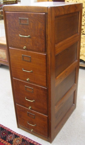 Appraisal: A FOUR-DRAWER OAK FILE CABINET American early th century having