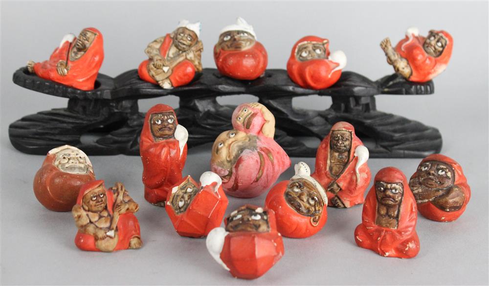 Appraisal: GROUP OF FIFTEEN BANKO SMALL RED PAINTED FIGURES OF DARUMA