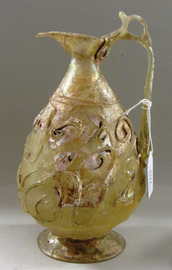 Appraisal: A clear glass ewer Iran th- th century with pear