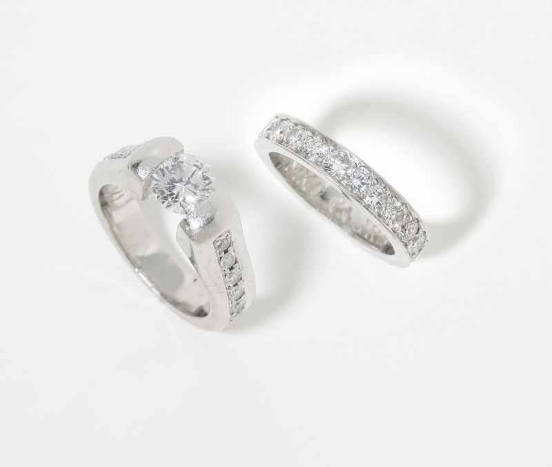 Appraisal: Platinum including a ring with a tension-set round brilliant-cut diamond