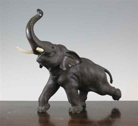 Appraisal: A Japanese Meiji period bronze of a trumpeting elephant in