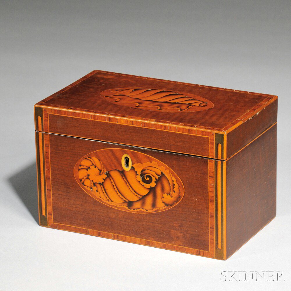 Appraisal: George III Mahogany Veneer Tea Caddy with inlaid seashell motifs