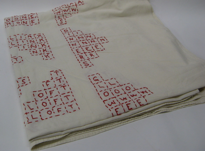 Appraisal: AN AMERICAN EMBROIDERED BED COVERLET signed on the edge Made