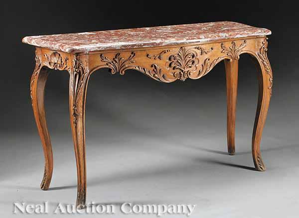 Appraisal: A French Provincial Walnut Console th c the molded rouge