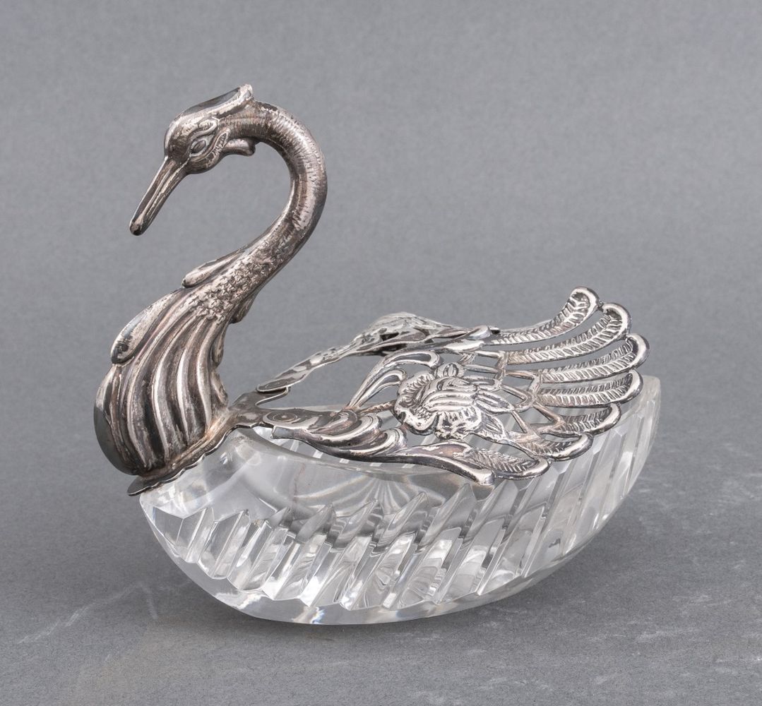 Appraisal: SILVERPLATE MOUNTED GLASS SWAN-FORM RING DISH Silverplate-mounted glass Swan-form ring