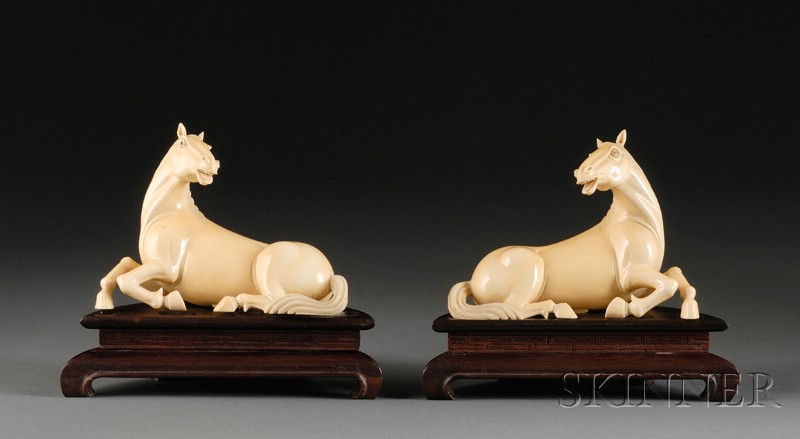 Appraisal: Pair of Ivory Carvings China th century depicting resting horses