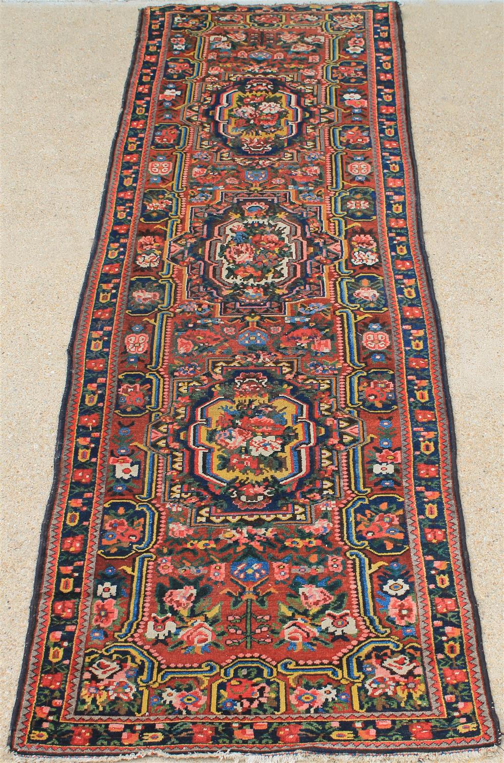 Appraisal: CAUCASIAN WOOL FLATWEAVE FLORAL RUNNER cotton warp unusual design on