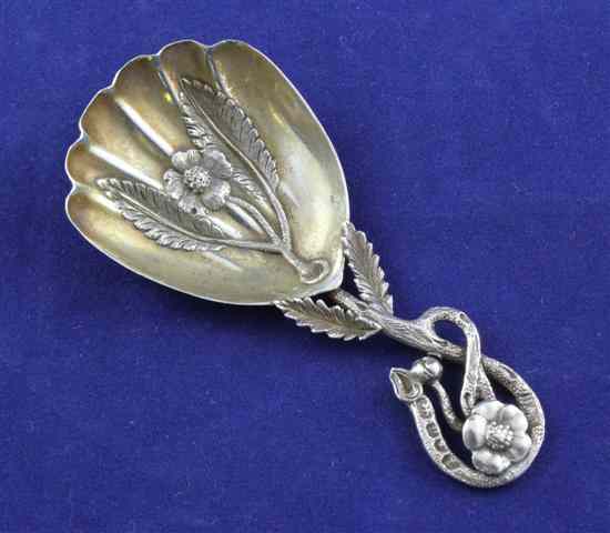 Appraisal: A Victorian silver caddy spoon with foliate handle and fluted