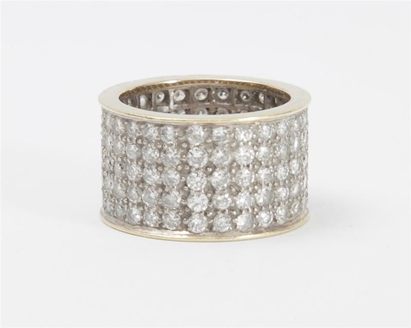 Appraisal: K YELLOW AND WHITE GOLD AND DIAMOND BAND RING The