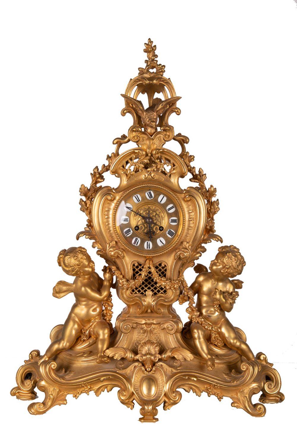 Appraisal: GILT BRONZE FIGURAL MANTLE CLOCK inches wide inches high Condition