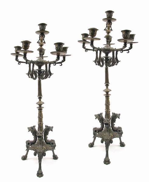 Appraisal: A pair of Charles X patinated bronze six light candelabra