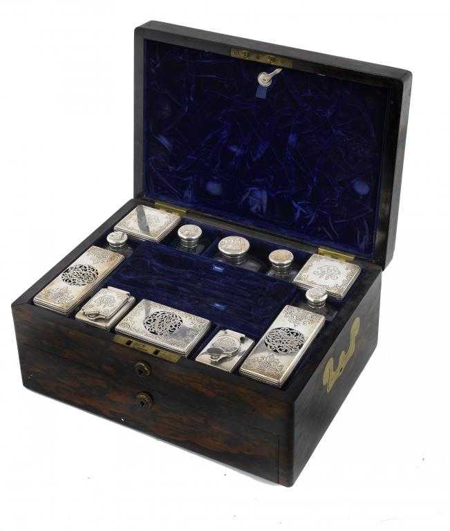 Appraisal: A WILLIAM IV SILVER-FITTED COROMANDEL DRESSING CASE lined in blue