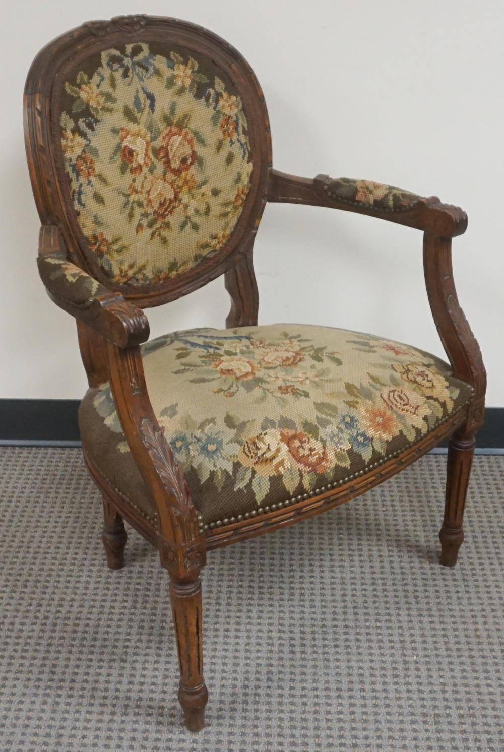 Appraisal: Louis XVI Style Carved Walnut and Upholstered Fauteuil