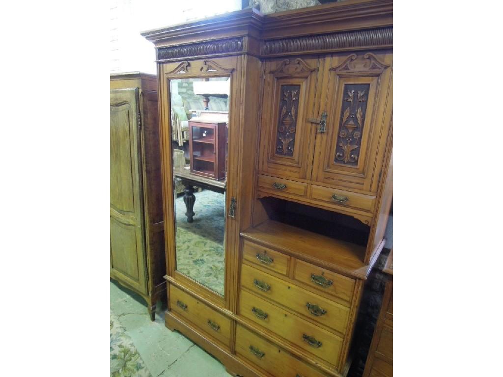 Appraisal: An Edwardian satin walnut compactum wardrobe with stepped and moulded