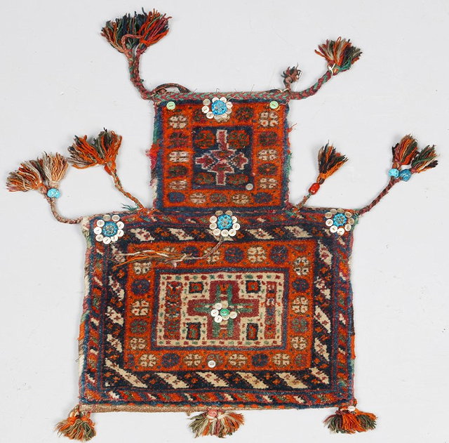 Appraisal: AN AFSHAR SALT BAG with polychrome decoration attached tassels and