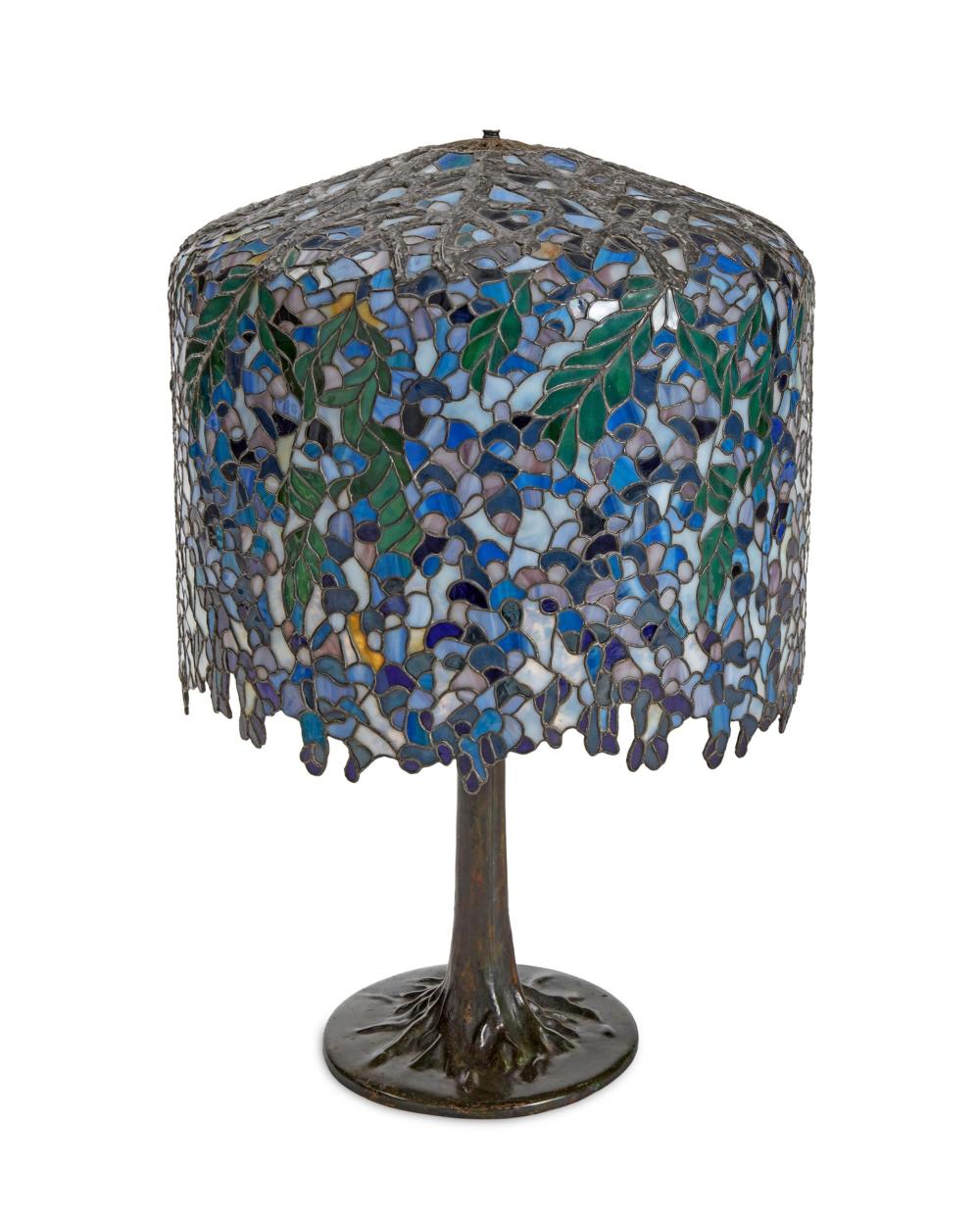 Appraisal: A Tiffany-style leaded glass table lamp Fourth-Quarter th Century Engraved