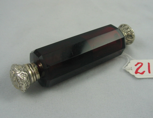 Appraisal: A VICTORIAN RUBY RED GLASS PERFUME lay-down style with ornate