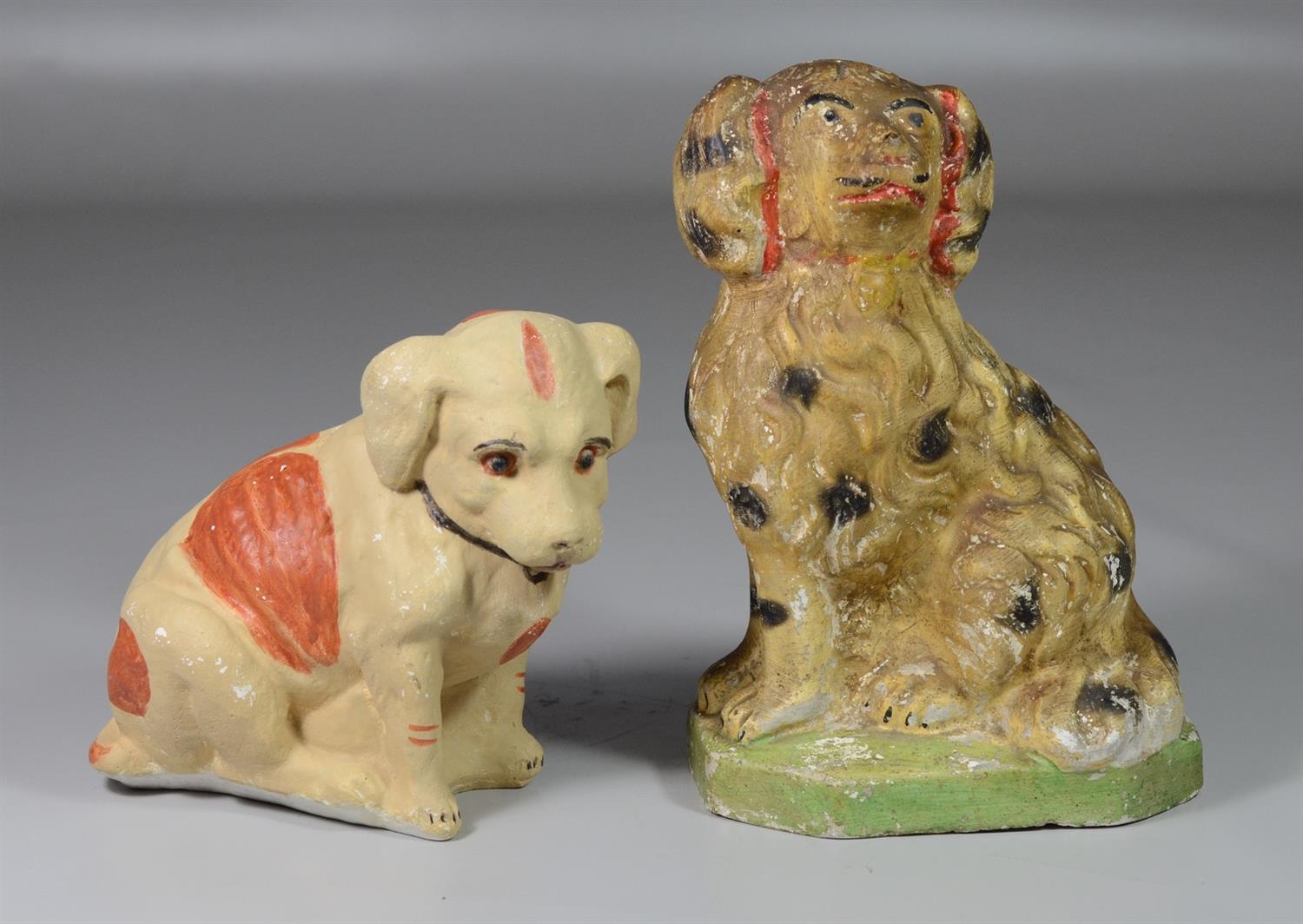 Appraisal: Painted chalkware dogs hollow spaniel mid- th C - h