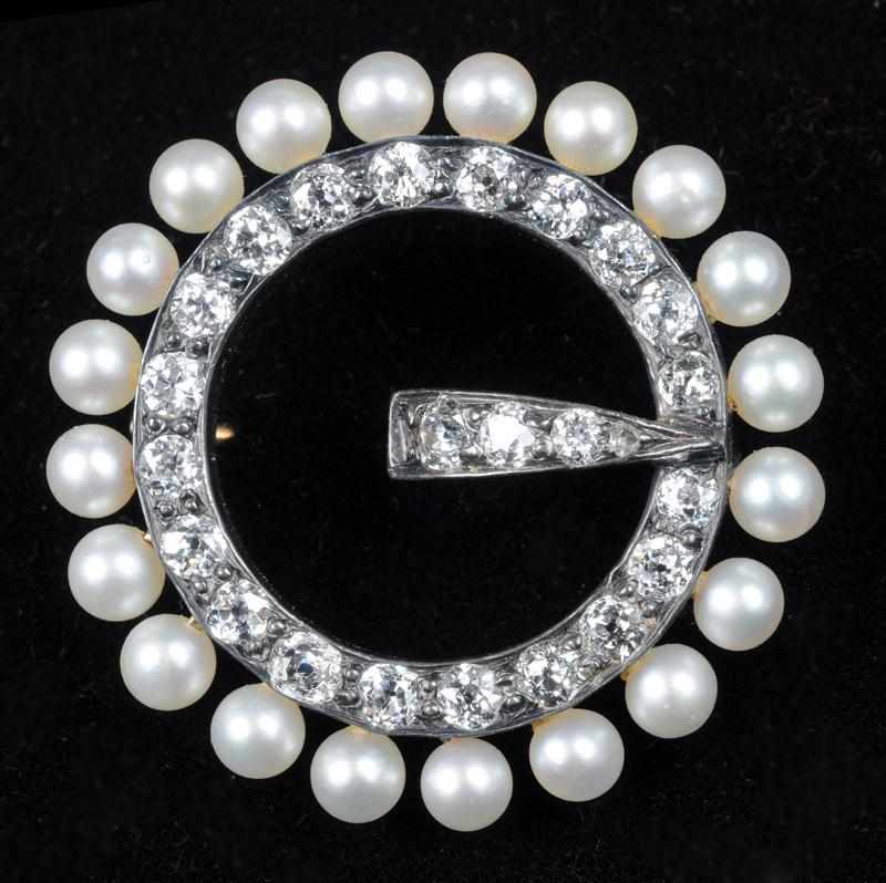 Appraisal: ANTIQUE SILVER PEARL AND DIAMOND CIRCLE PIN Set through with