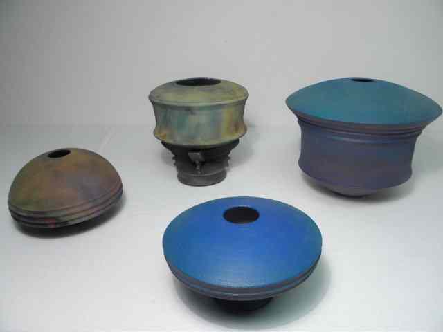 Appraisal: Lot of four contemporary art pottery vases All pieces are