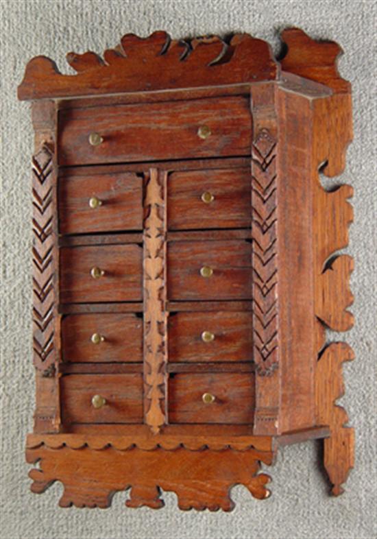 Appraisal: Walnut Hanging Spice Rack Circa Eight drawers over one drawer