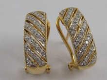 Appraisal: A pair of yellow and white metal tests carat gold