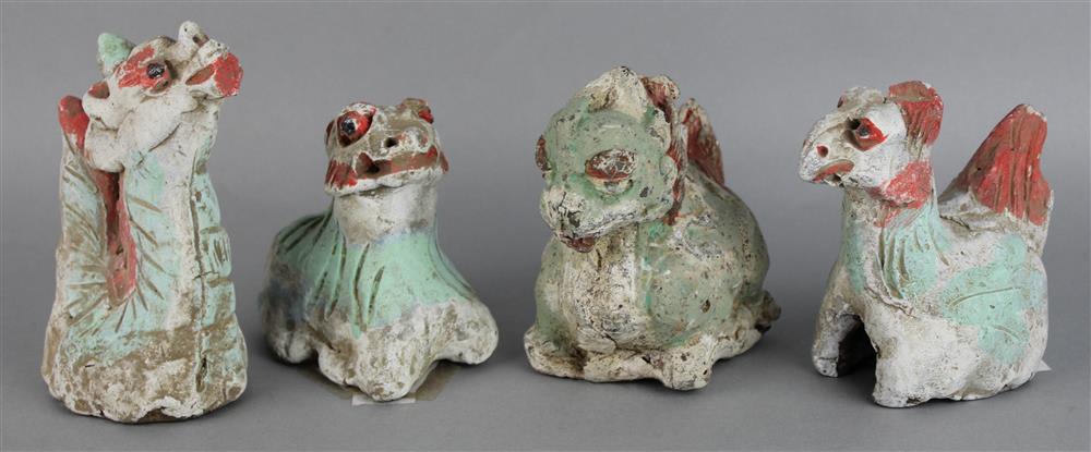 Appraisal: FOUR CHINESE PAINTED POTTERY FIGURES the group of grey pottery