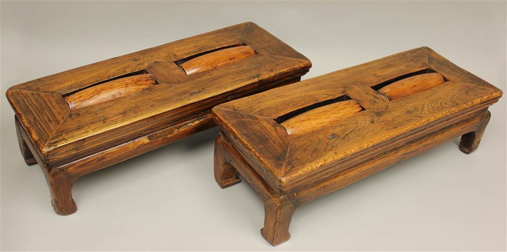 Appraisal: PAIR OF CHINESE STAINED ELM LONG FOOT STOOLS of simple