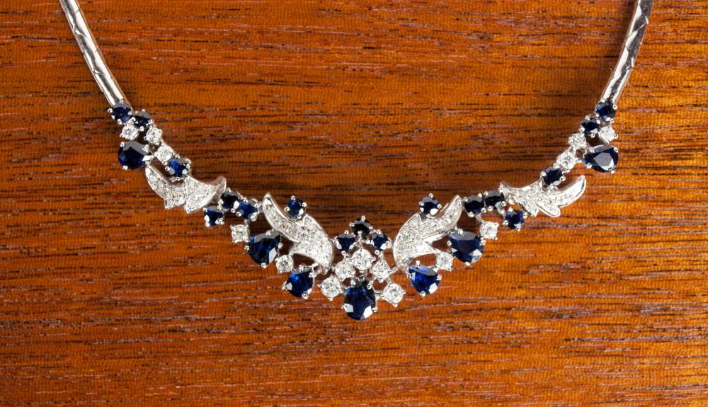 Appraisal: DIAMOND SAPPHIRE AND EIGHTEEN KARAT GOLD NECKLACE The k white