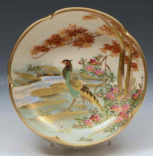 Appraisal: A JAPANESE SATSUMA SMALL BOWL painted with a central peacock