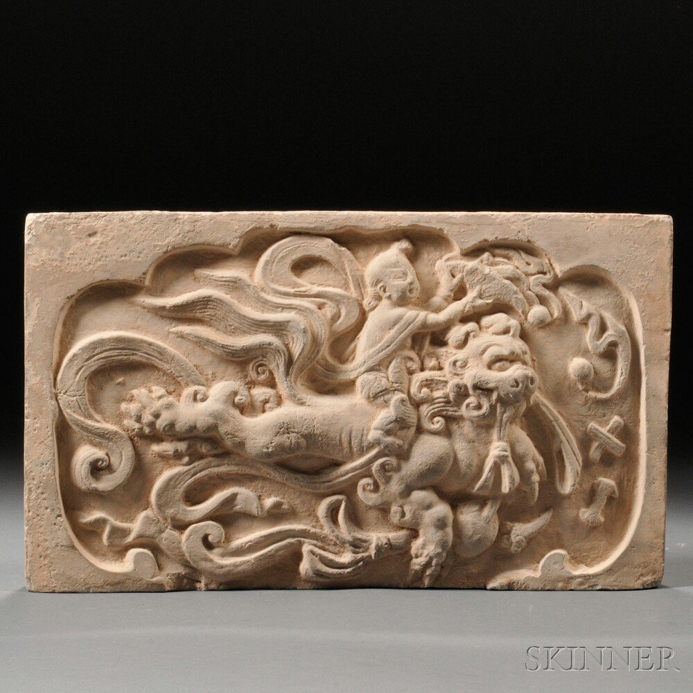 Appraisal: Earthenware Tile China rectangular decorated with a boy riding on