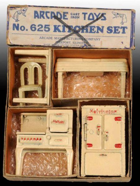 Appraisal: Cast Iron Arcade Toy Kitchen Set in OB Description Includes