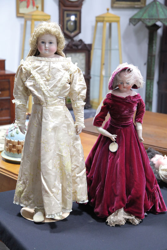 Appraisal: TWO BISQUE HEAD DOLLS Each with repairs and restoration Kidskin